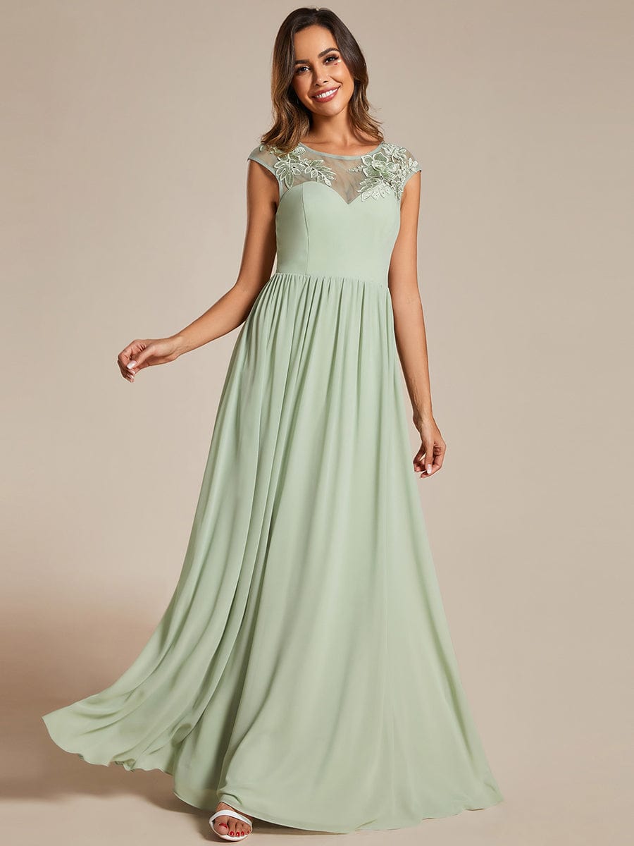 Elegant Chiffon A-Line Evening Gown with Cap Sleeves and Shoulder Applique