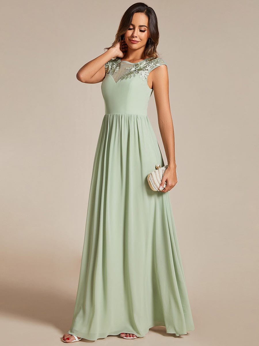 Elegant Chiffon A-Line Evening Gown with Cap Sleeves and Shoulder Applique