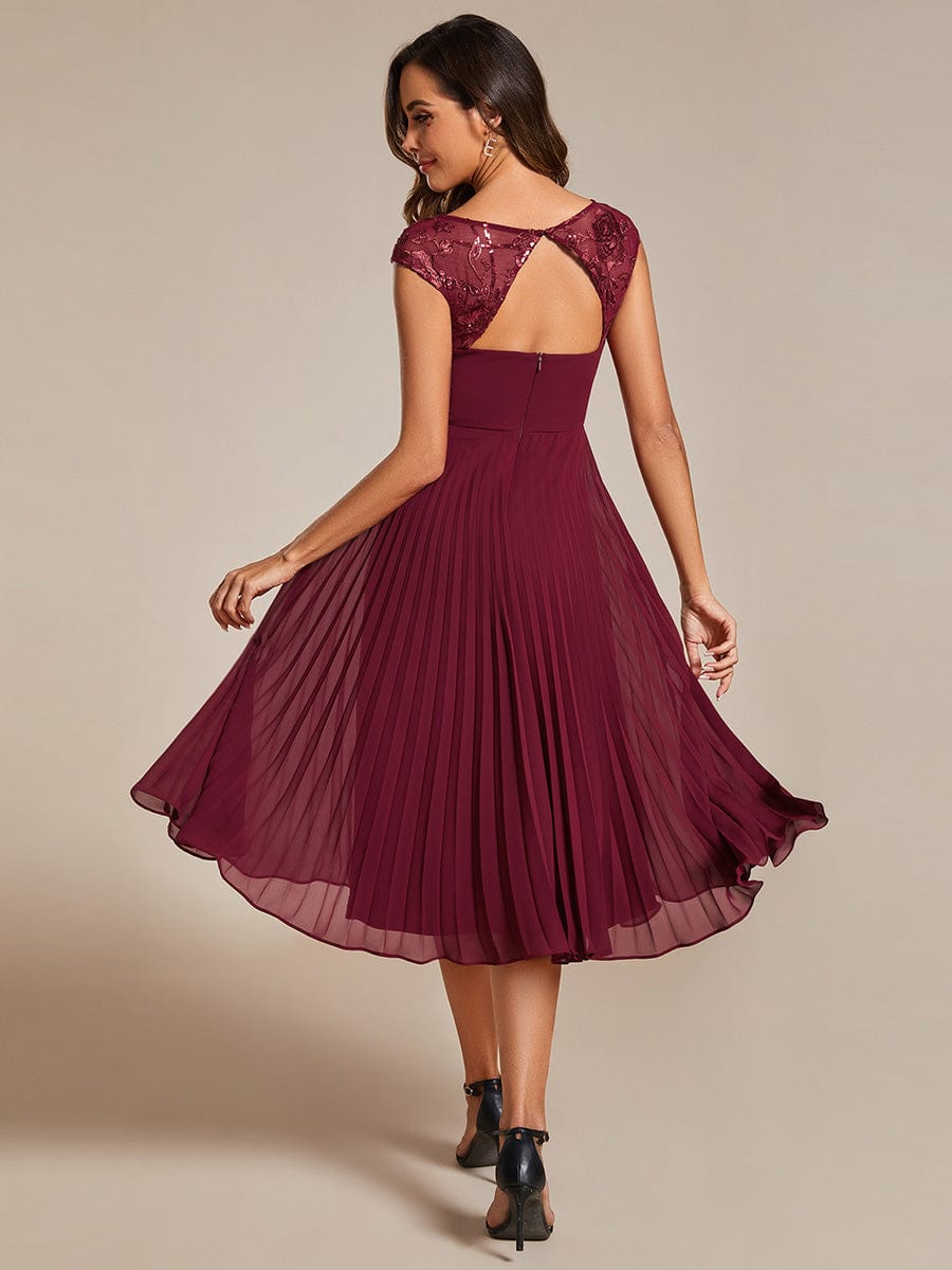 Chic A-Line Chiffon Wedding Guest Dress with Cap Sleeves and Pleats.