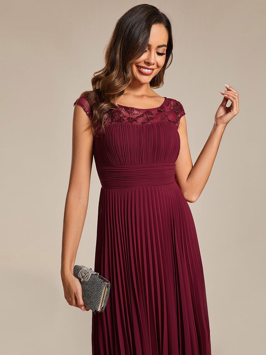 Chic A-Line Chiffon Wedding Guest Dress with Cap Sleeves and Pleats.