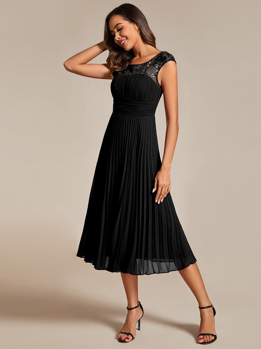 Chic A-Line Chiffon Wedding Guest Dress with Cap Sleeves and Pleats.