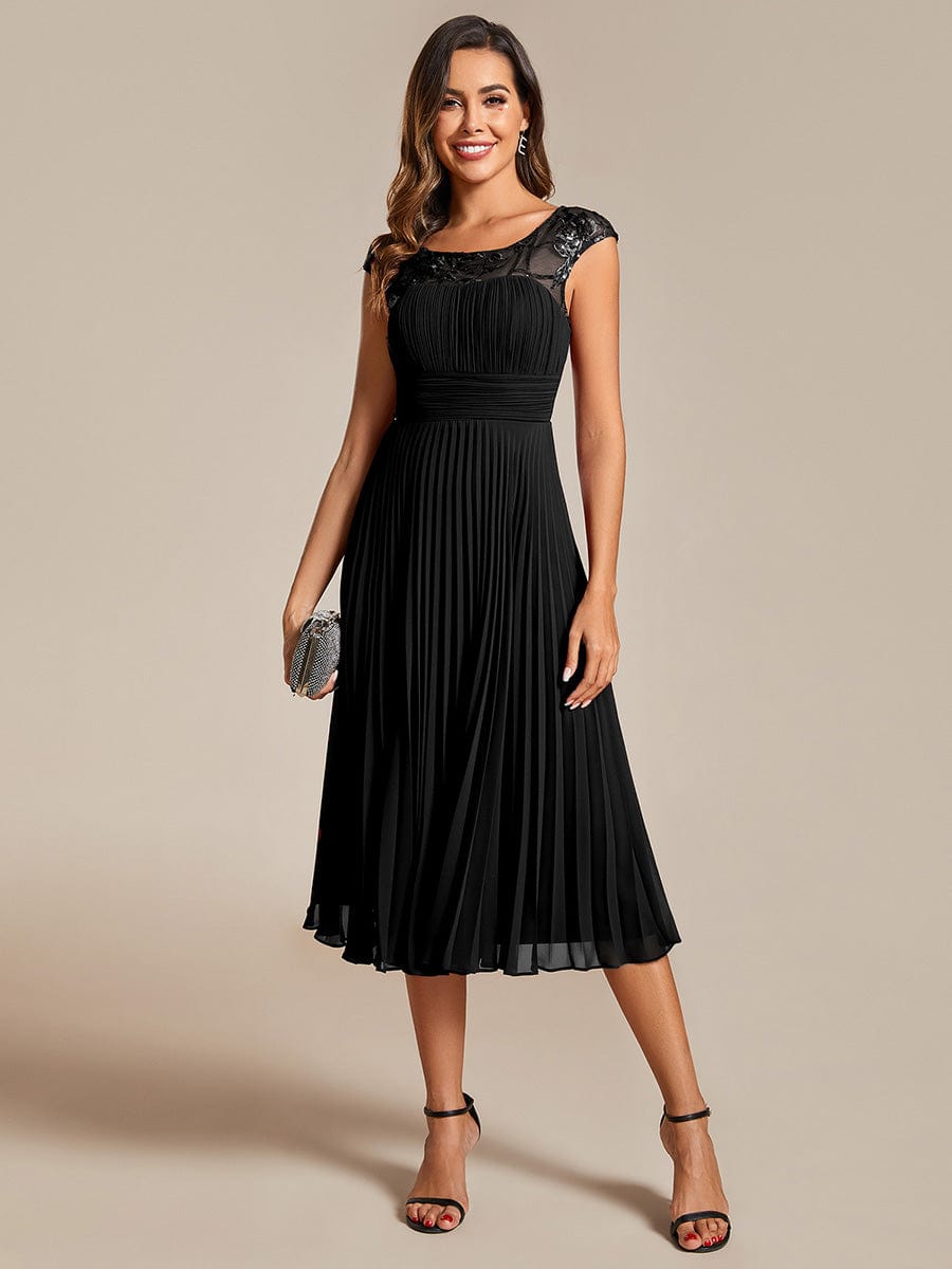 Chic A-Line Chiffon Wedding Guest Dress with Cap Sleeves and Pleats.